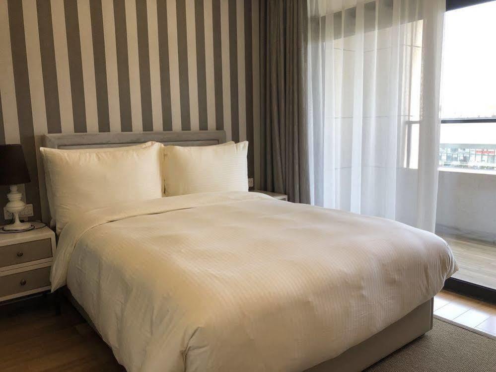 One Sunland Serviced Suites Managed By Lanson Place Шанхай Экстерьер фото